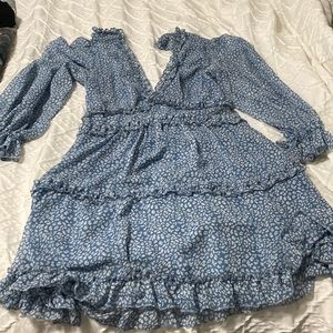 Blue and white.  V neck dress with open back size medium.